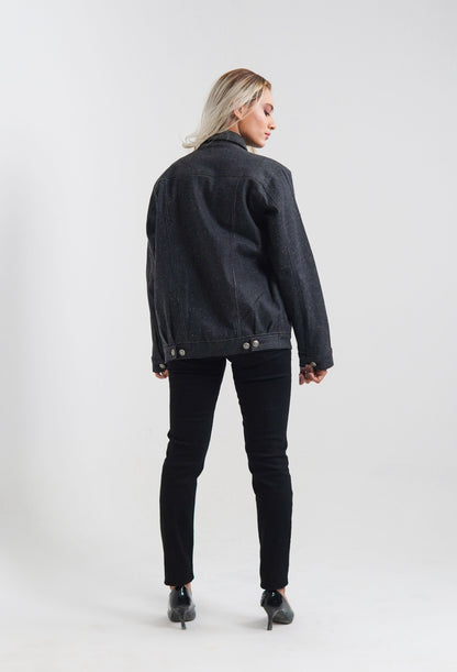 women's black denim jacket with a collared neckline and button details