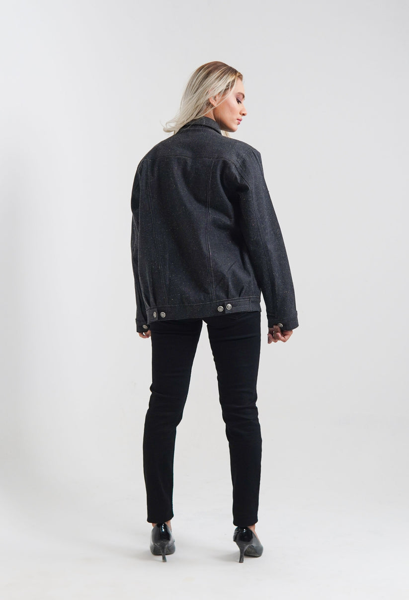 women's black denim jacket with a collared neckline and button details