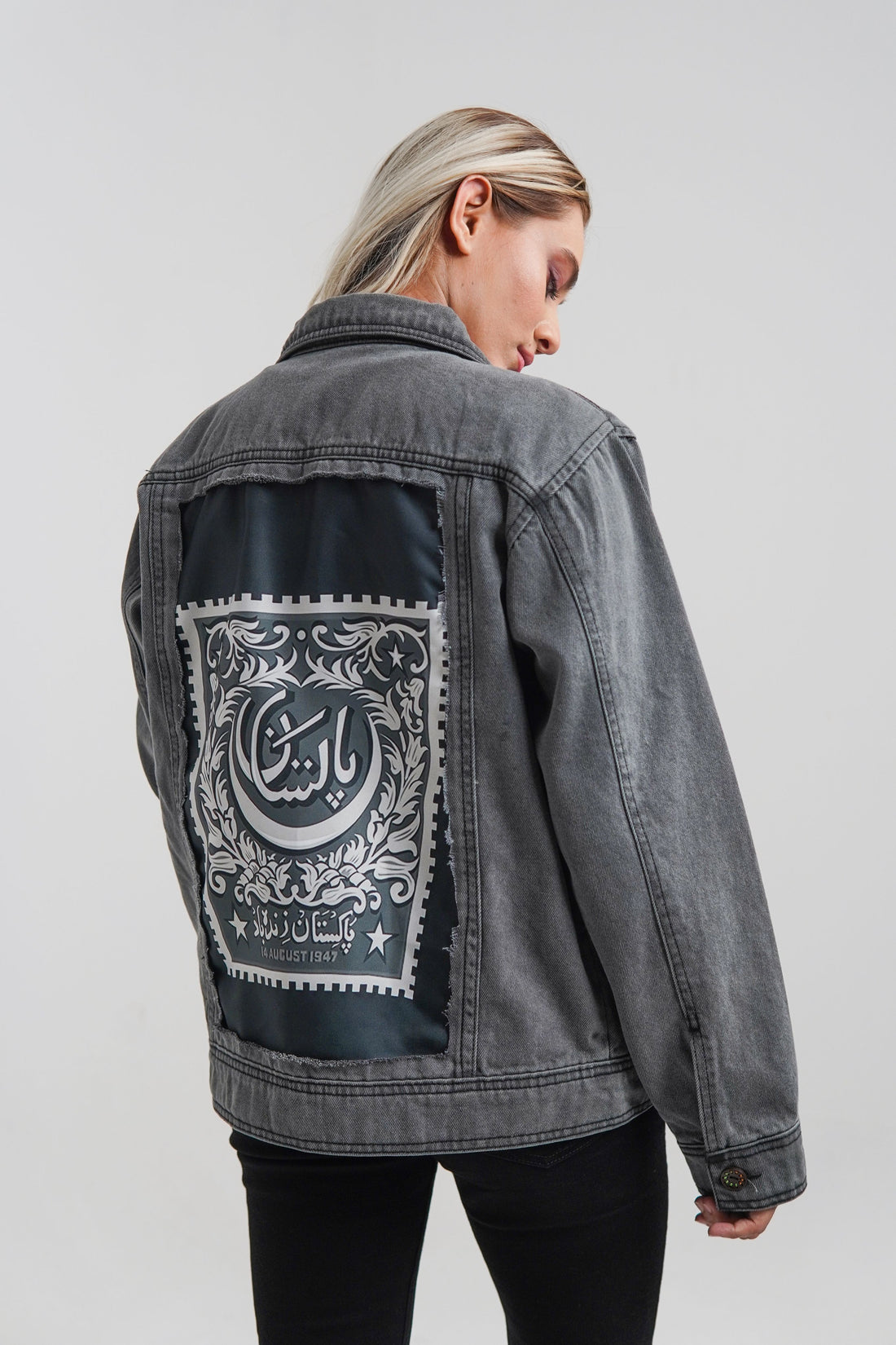Women's denim jacket in grey with a slogan on the front and back