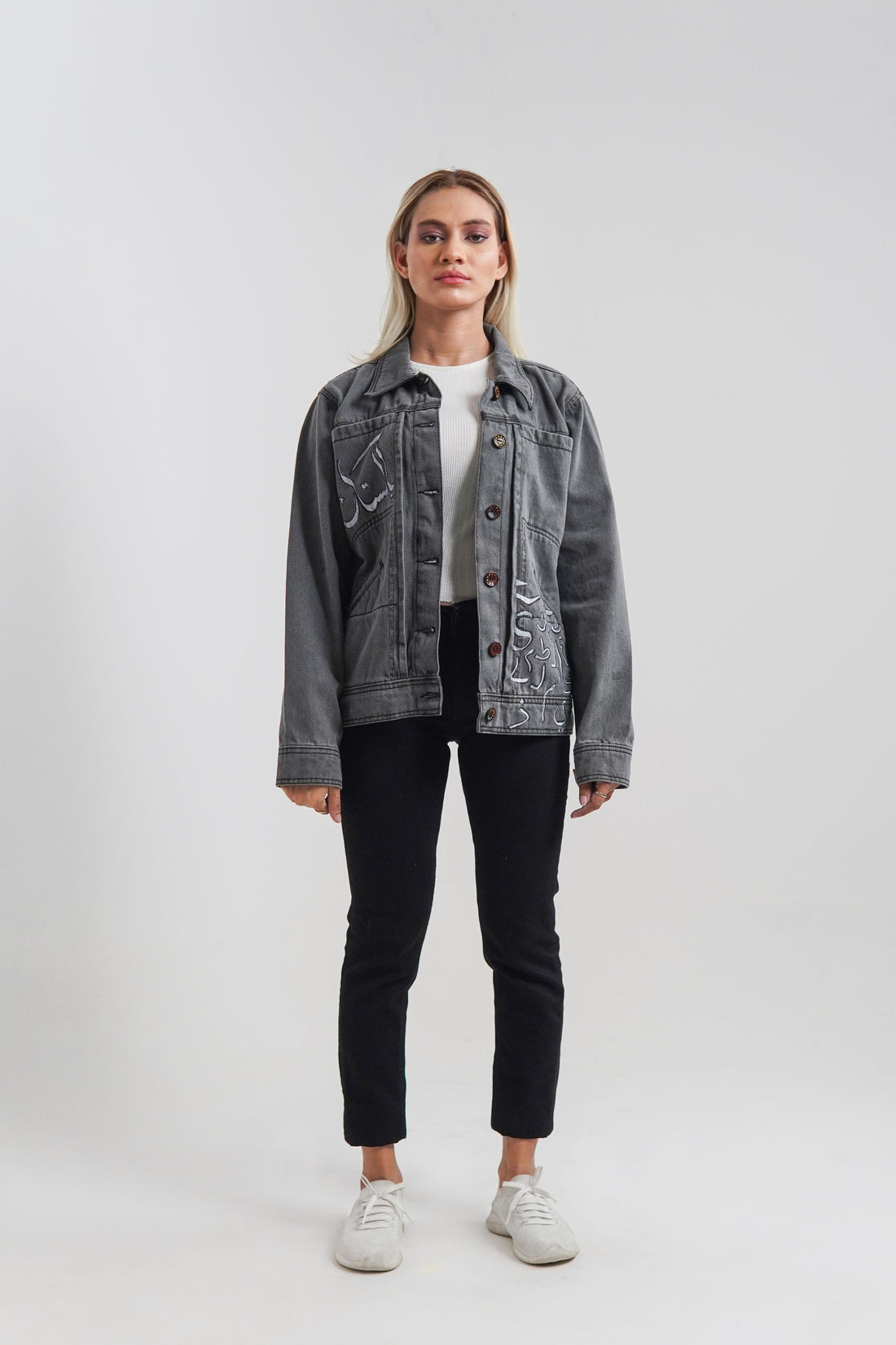 Women's denim jacket in grey with a slogan on the front and back