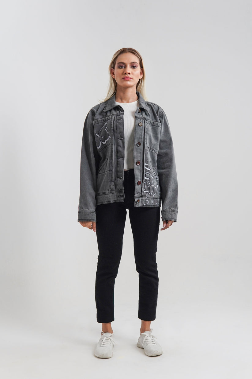 Women's denim jacket in grey with a slogan on the front and back